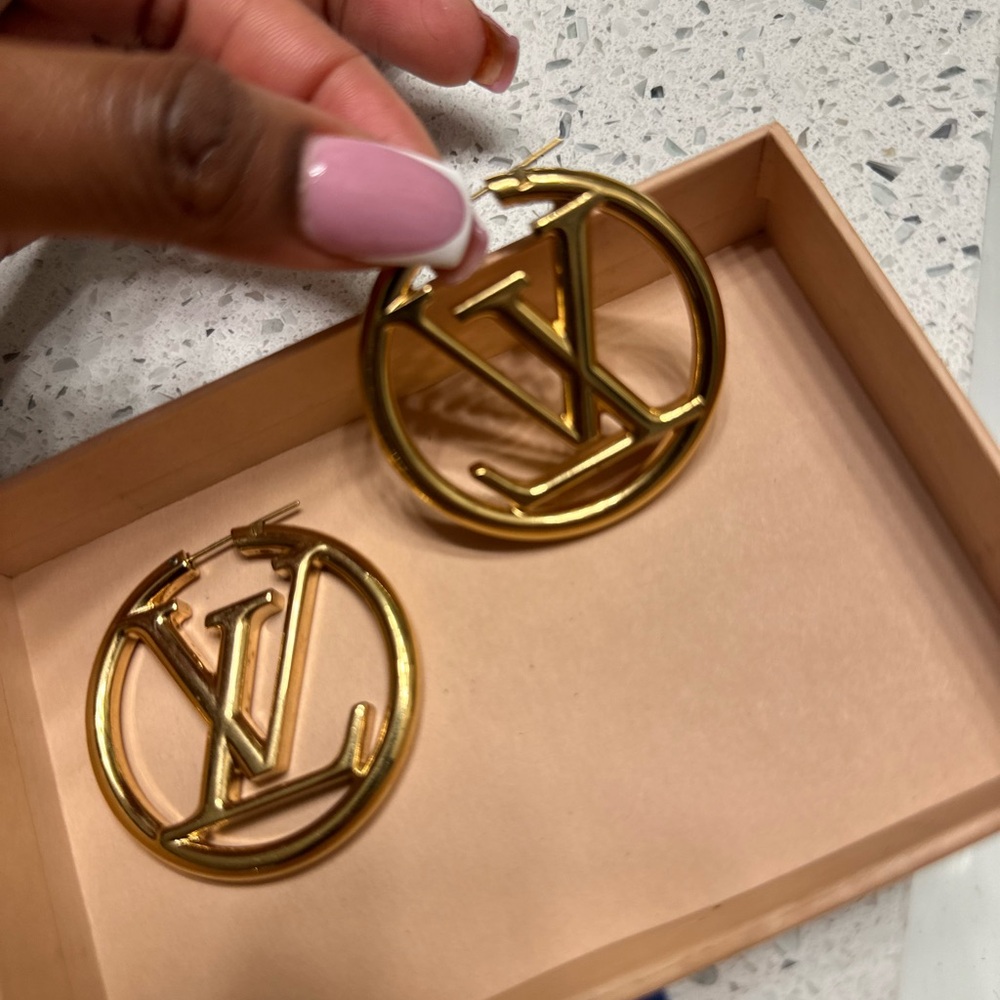 Authentic Louis Vuitton hoop GM earrings, serial number provided.Comes with box.